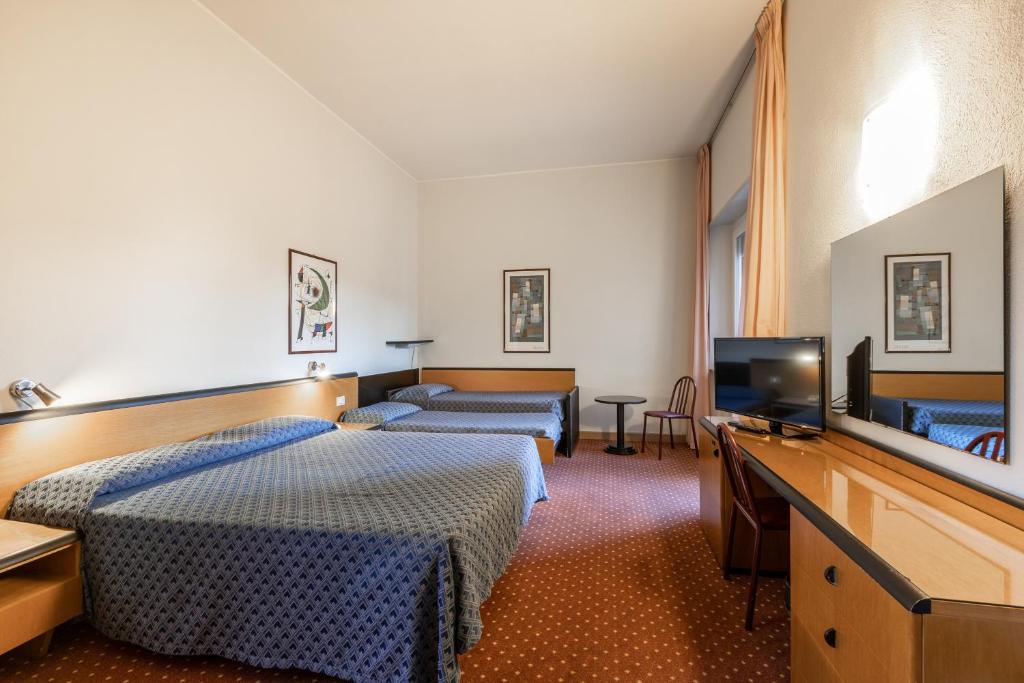TV a/nebo společenská místnost v ubytování Hotel Nuova Grosseto