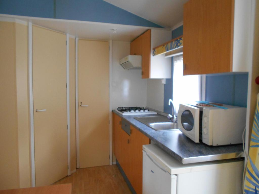 Kuchyň nebo kuchyňský kout v ubytování Camping Bellevue