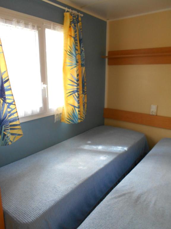 Postel nebo postele na pokoji v ubytování Camping Bellevue