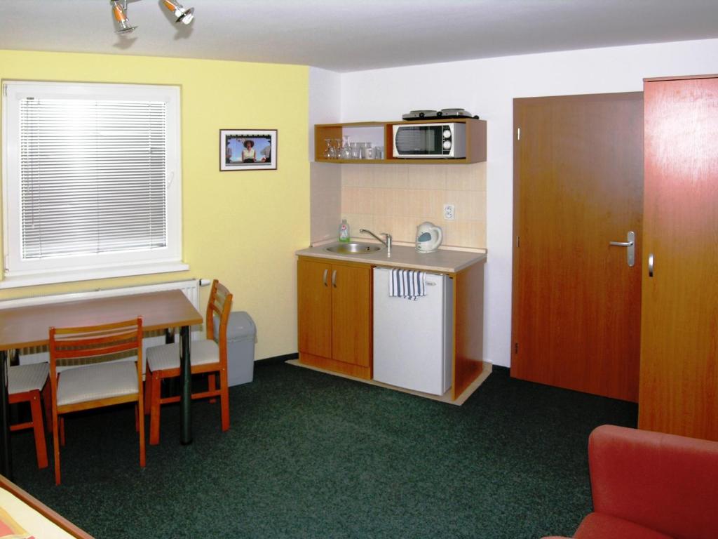 Kuchyň nebo kuchyňský kout v ubytování Apartmány Family Veľký Meder