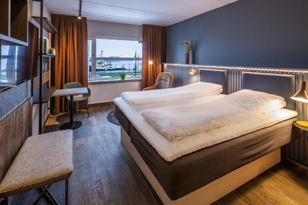 Postel nebo postele na pokoji v ubytování Pier 5 Hotel
