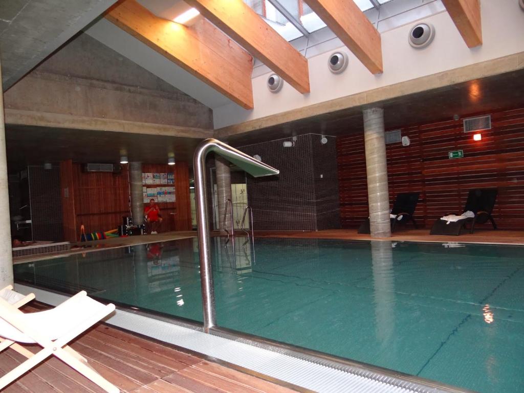 Bazén v ubytovaní 120 w 5 gwiazdowym ROYAL TULIP SAND 200 m od plaży DOBRUK APARTAMENTY alebo v jeho blízkosti
