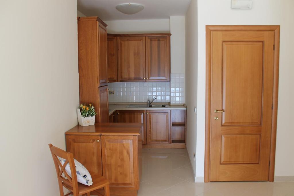 A kitchen or kitchenette at Lido Resort