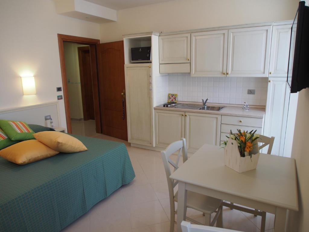 A kitchen or kitchenette at Lido Resort