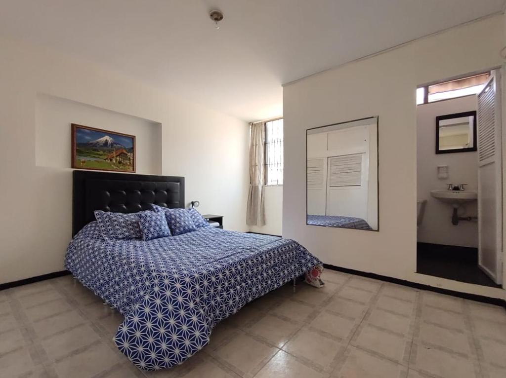 Postel nebo postele na pokoji v ubytování CASA HOTEL MODELIA REAL
