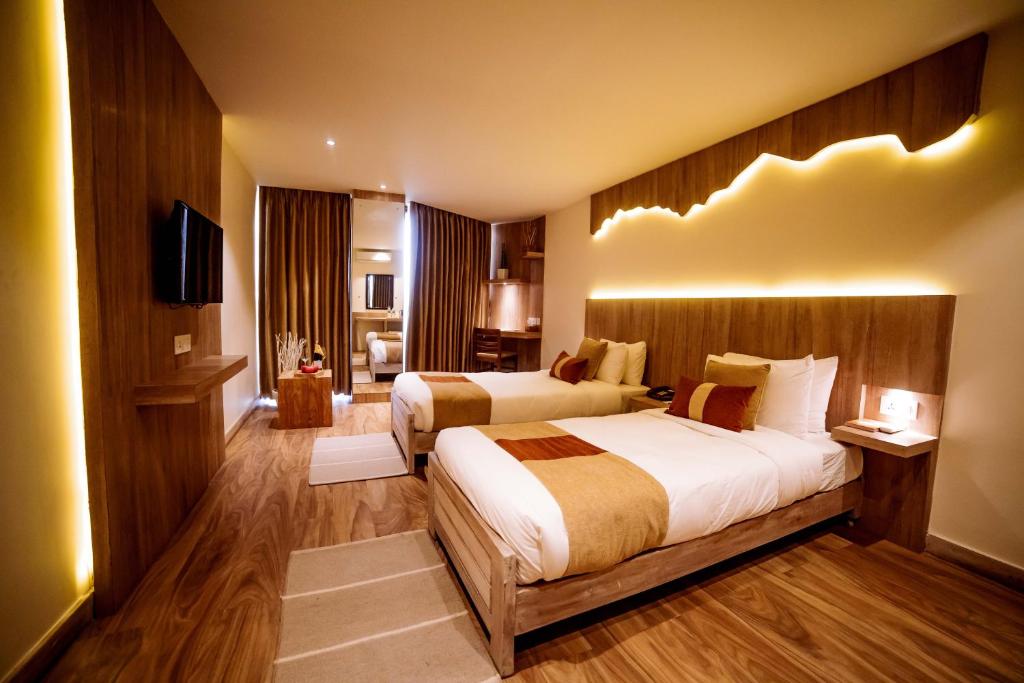 Aabas Pokhara by Barahi Hospitality 객실 침대