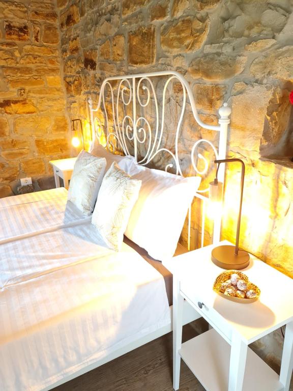 Postel nebo postele na pokoji v ubytování CASA VILLANOVA homes