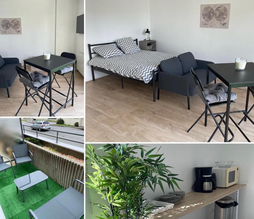 Cette chambre comprend une table, une table et des chaises. dans l'établissement L'essentiel, à Noyal-sur-Vilaine