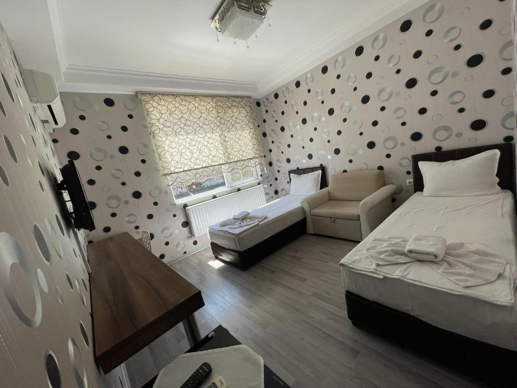 Postel nebo postele na pokoji v ubytování Hotel Dunav