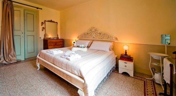 Łóżko lub łóżka w pokoju w obiekcie Bed and Breakfast Evelina