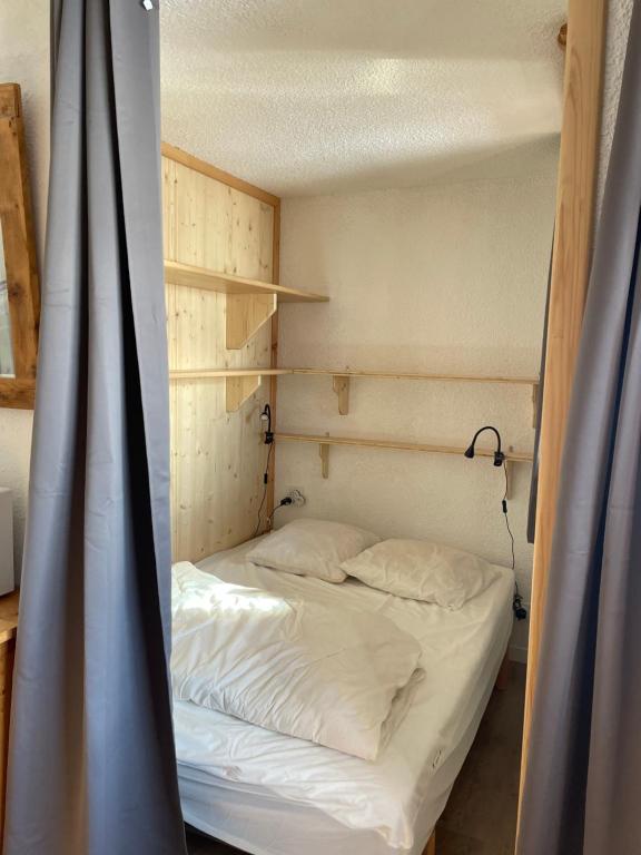 Postel nebo postele na pokoji v ubytování Résidence le Joker