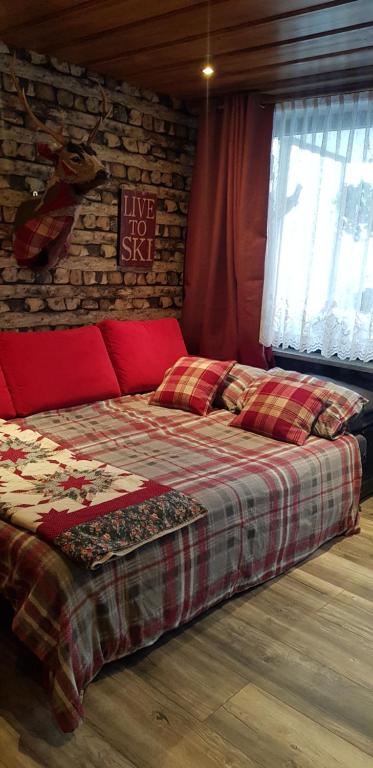 Postel nebo postele na pokoji v ubytování Maisalm, Apt 4