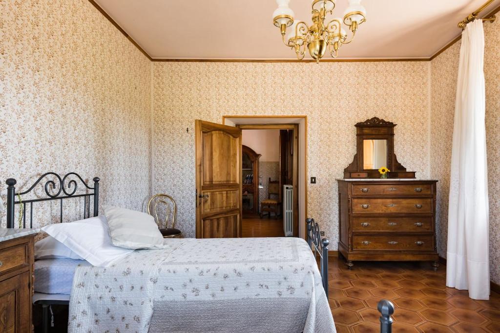 Postel nebo postele na pokoji v ubytování Villa Eleonora