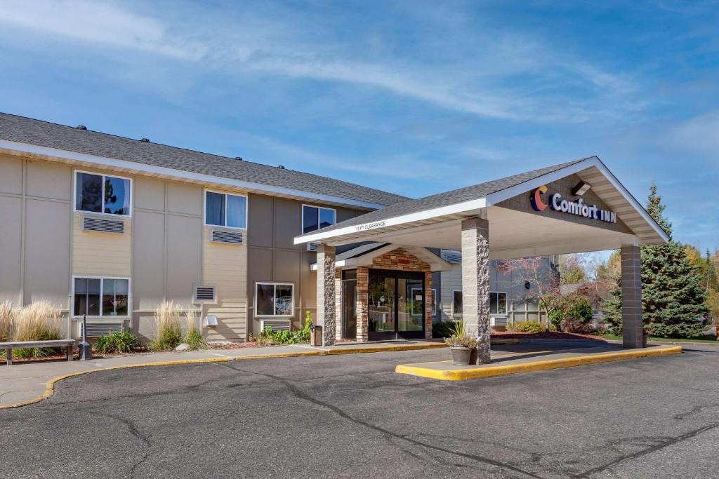 a view of a hotel with a gas station at Comfort Inn Rhinelander in Rhinelander