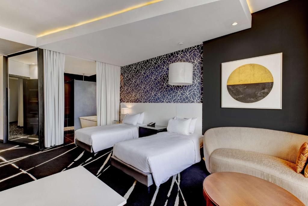 Ένα ή περισσότερα κρεβάτια σε δωμάτιο στο Radisson Blu Lagos Ikeja