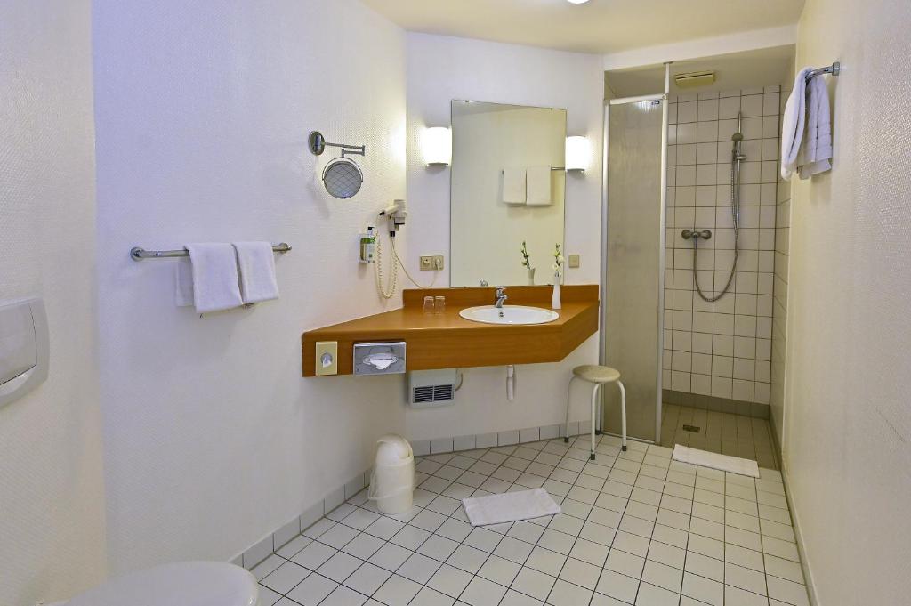 Koupelna v ubytování HESSE HOTEL Celle