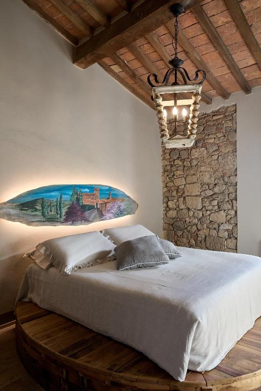Posteľ alebo postele v izbe v ubytovaní Bolgheri Wine Suite