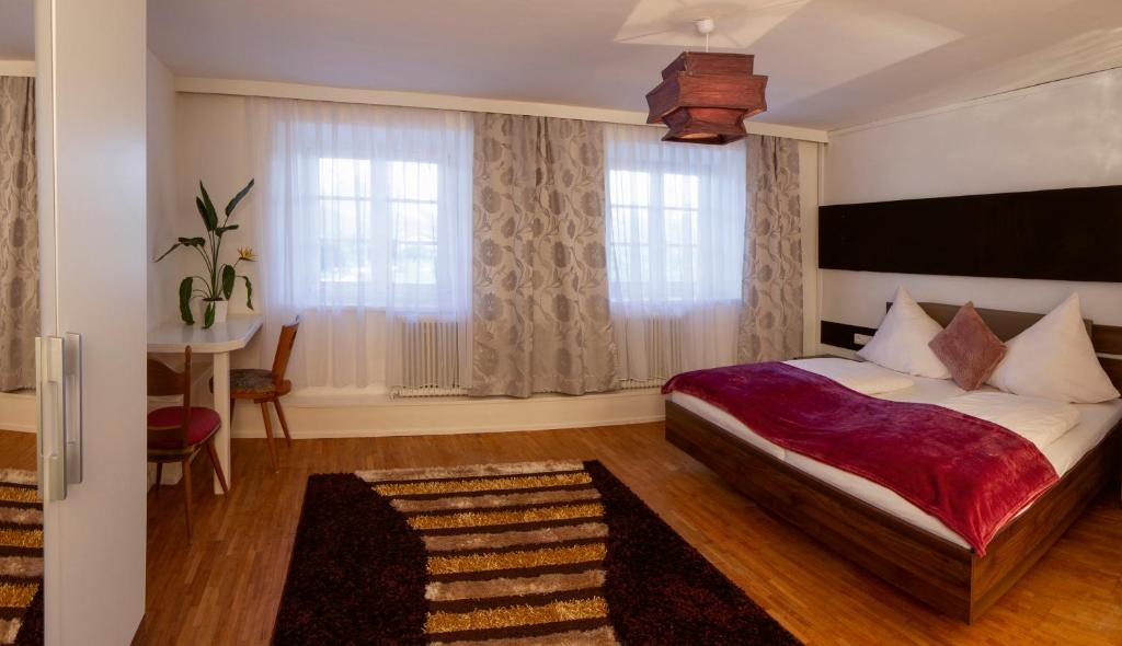 Postel nebo postele na pokoji v ubytování Gasthof zur Post