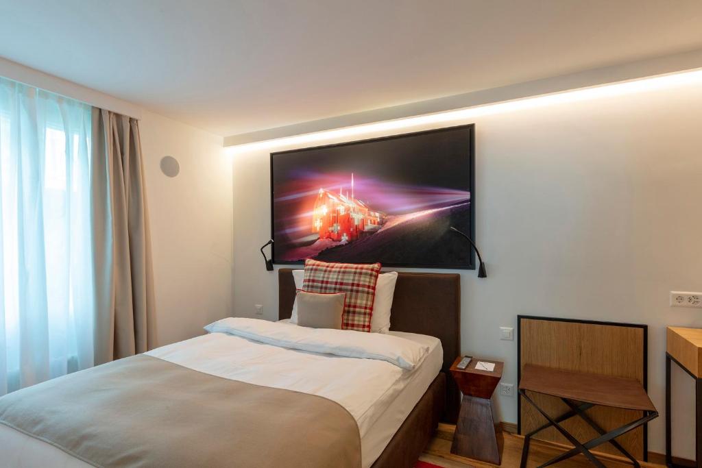 Postel nebo postele na pokoji v ubytování Fred Hotel Leonhardstrasse - Mobile Check-in
