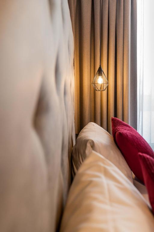 Postel nebo postele na pokoji v ubytování Hotel Astrid - inklusive kostenfreier JokerCard