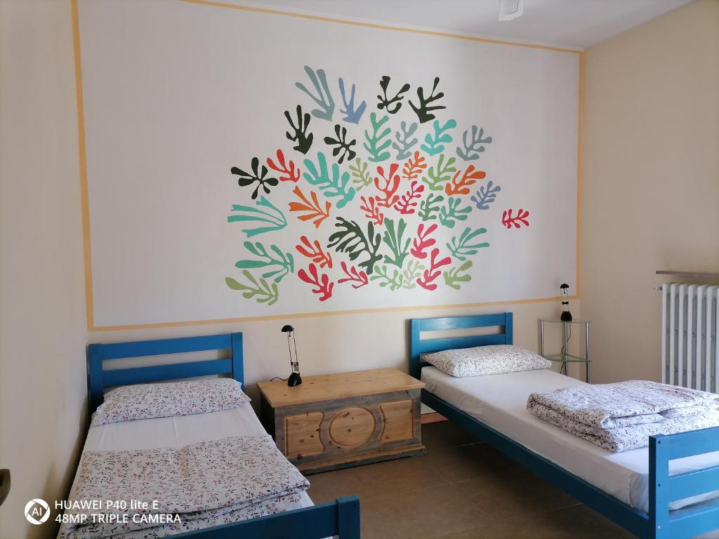 Postel nebo postele na pokoji v ubytování BeB Dorotina