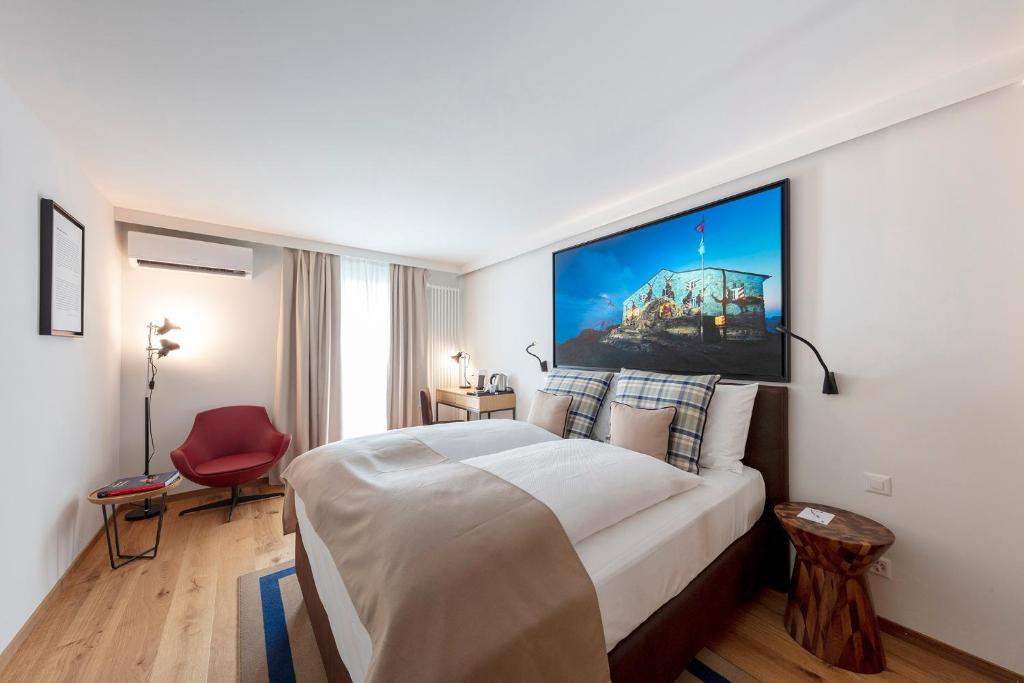 Postel nebo postele na pokoji v ubytování Fred Hotel Leonhardstrasse - Mobile Check-in