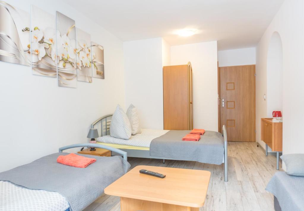 Malinowy Domek - Premium Quadruple Room