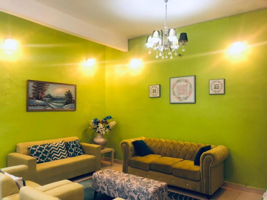 Khu vực ghế ngồi tại Galleria Homestay Islamic Alor Setar