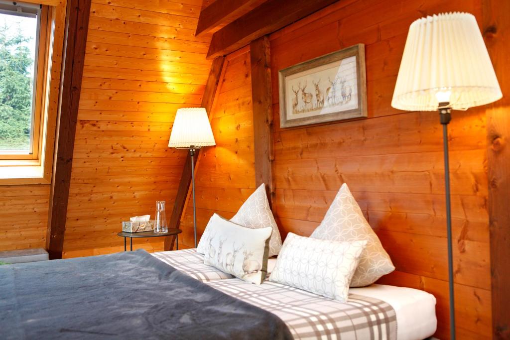 Postel nebo postele na pokoji v ubytování Chalet am Birkenhain