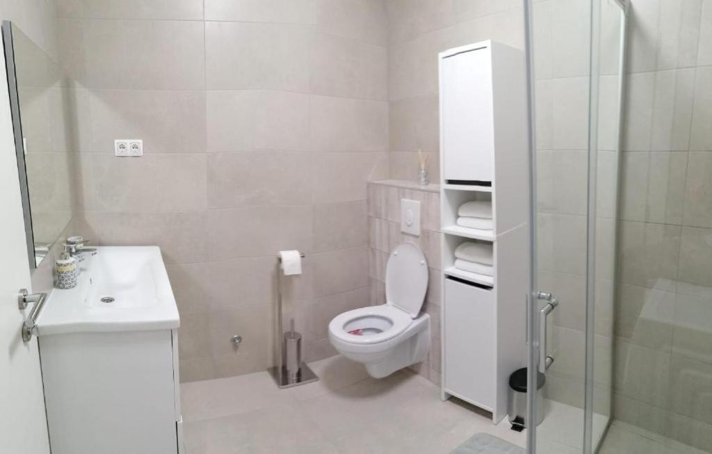 Kúpeľňa v ubytovaní Apartament Wioletta Ciovo Okrug Gornji