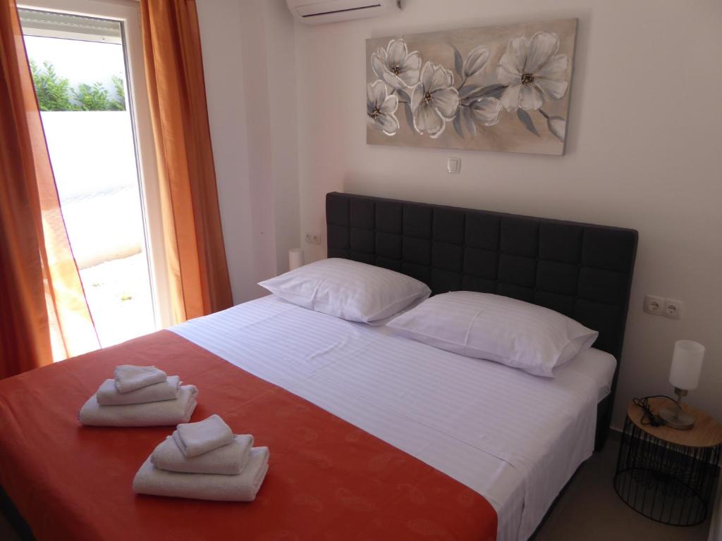 Posteľ alebo postele v izbe v ubytovaní Apartament Wioletta Ciovo Okrug Gornji
