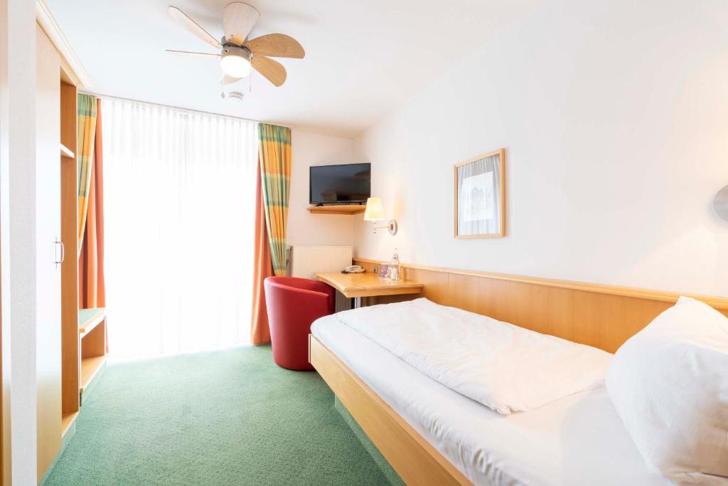Postel nebo postele na pokoji v ubytování Hotel Brauerei Gasthof Höhn