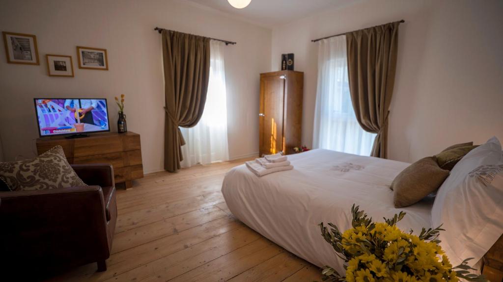 Postel nebo postele na pokoji v ubytování Locanda Dell'Oleificio