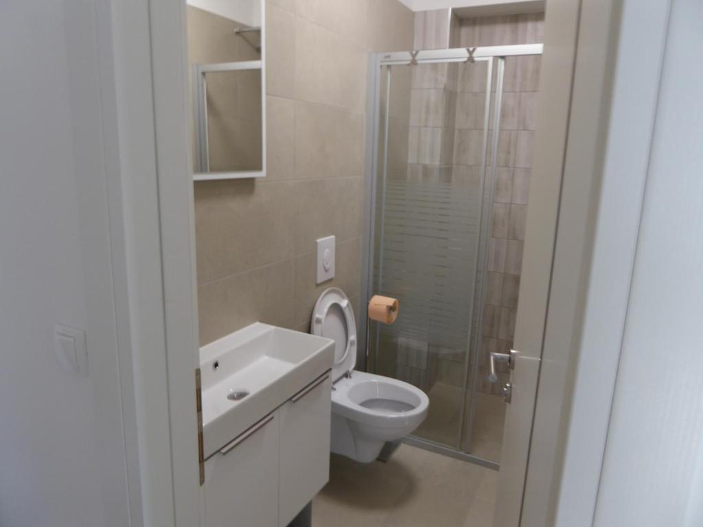 Kúpeľňa v ubytovaní Apartament Wioletta Ciovo Okrug Gornji