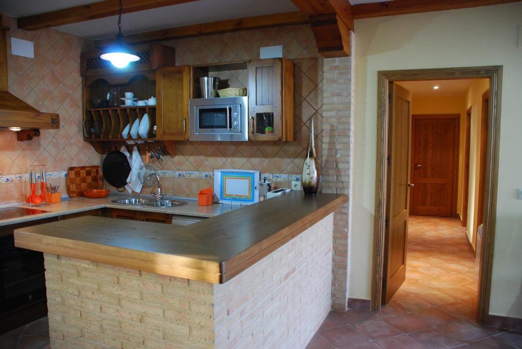 Kuchyň nebo kuchyňský kout v ubytování Casa Rural Tablas de Daimiel