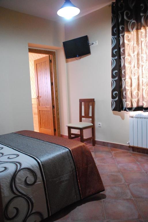 Postel nebo postele na pokoji v ubytování Casa Rural Tablas de Daimiel