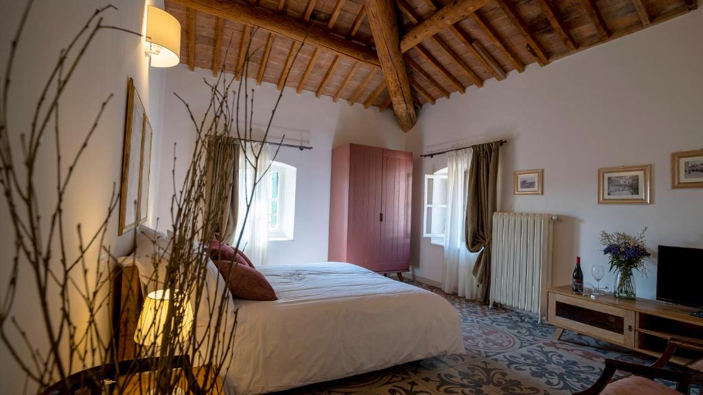 Postel nebo postele na pokoji v ubytování Locanda Dell'Oleificio