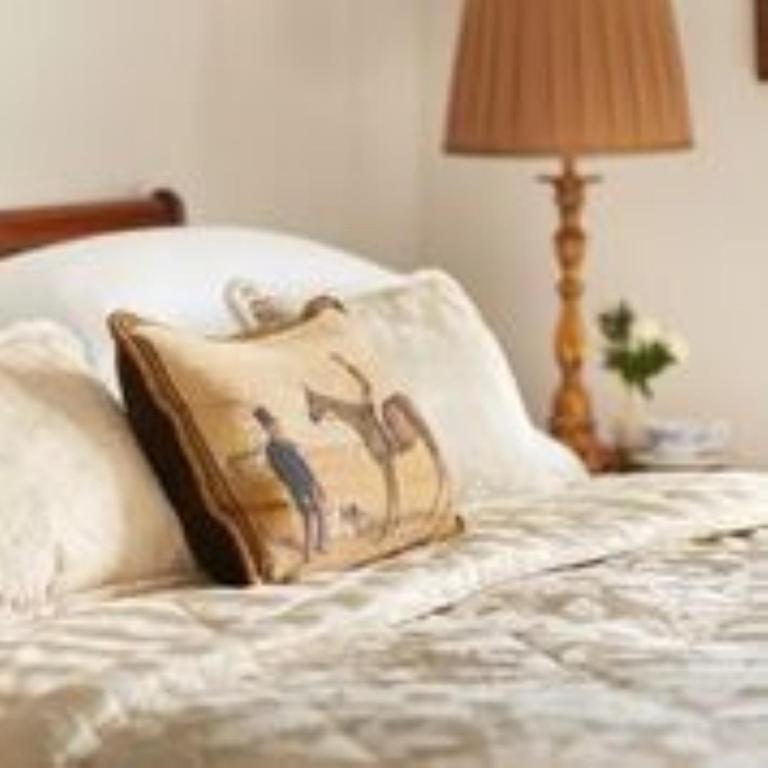 Letto o letti in una camera di Heatons Guesthouse