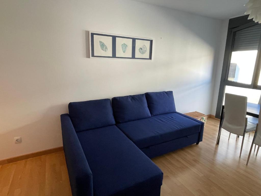 Posezení v ubytování Relájate en Ramales de la Victoria, apartamento con piscina y parking