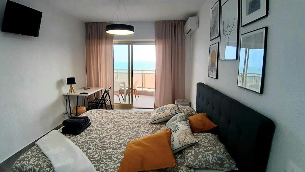 Posteľ alebo postele v izbe v ubytovaní Sunset Beach