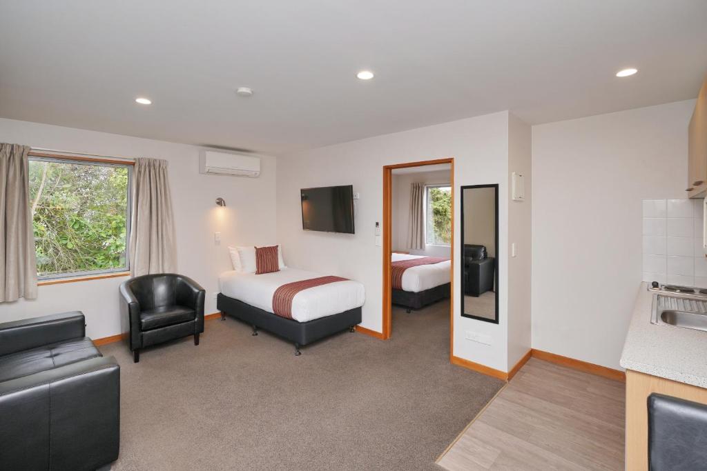 TV a/nebo společenská místnost v ubytování 306 Motel Apartments