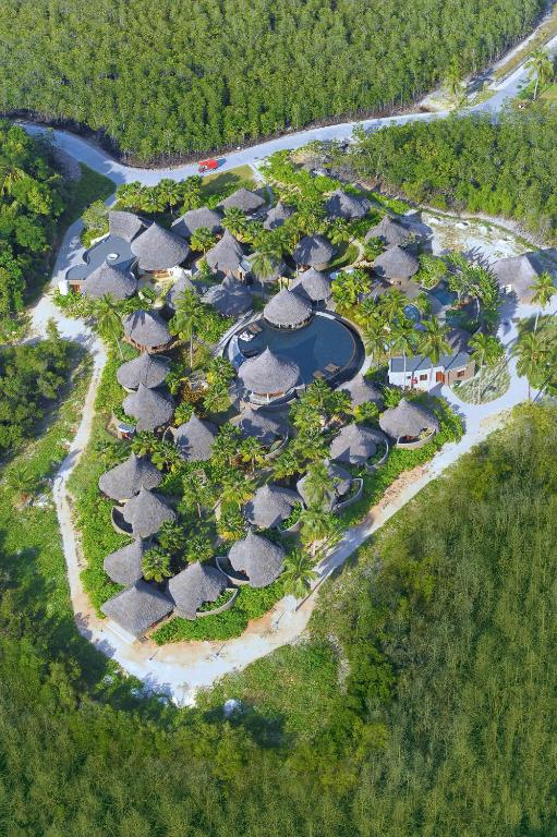 an aerial view of a resort with a resort at Constance Ephelia in Port Glaud