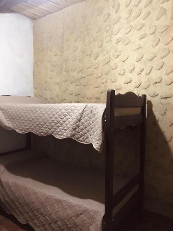 Postel nebo postele na pokoji v ubytování Matices de Molinos Hostal