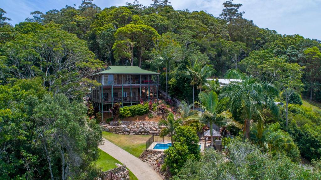 an aerial view of a house in the forest at The Junglehouse Noosa in Doonan