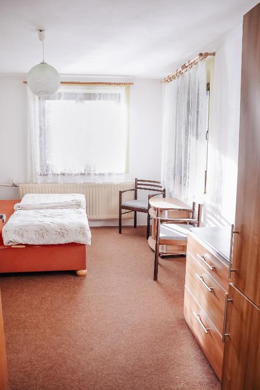 Postel nebo postele na pokoji v ubytování Chalupa Bob a Bobek