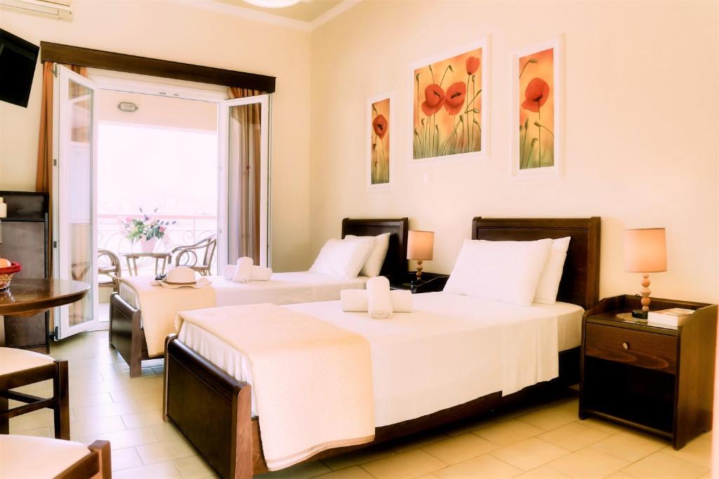 Postel nebo postele na pokoji v ubytování Molfetta Beach Hotel 