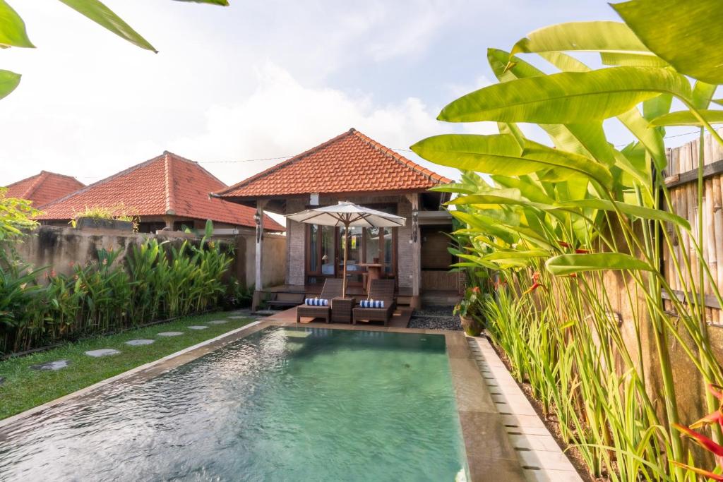 Bazén v ubytování Sridewi Villas Ubud nebo v jeho okolí