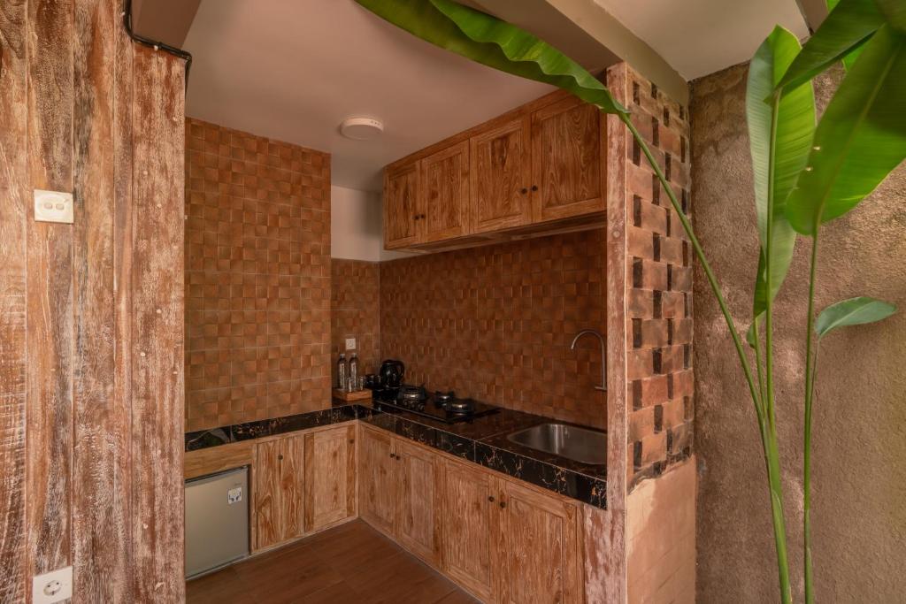 Kuchyň nebo kuchyňský kout v ubytování Sridewi Villas Ubud