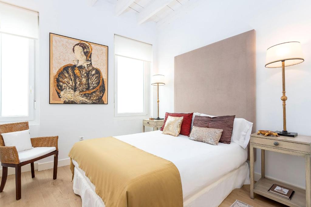 Postel nebo postele na pokoji v ubytování Genteel Home Julio César