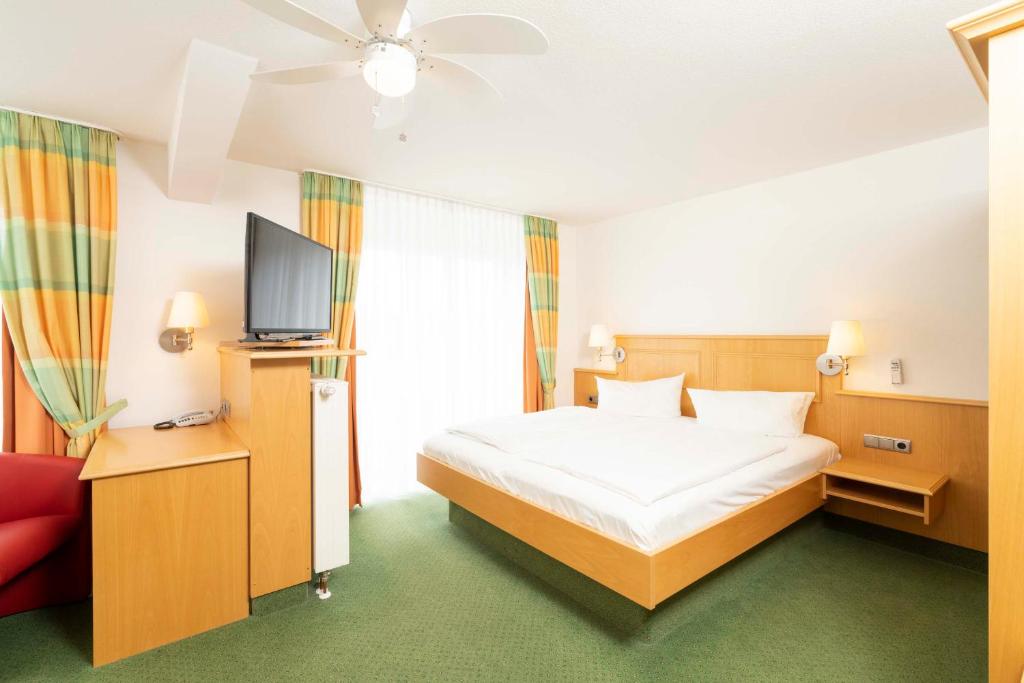 Postel nebo postele na pokoji v ubytování Hotel Brauerei Gasthof Höhn